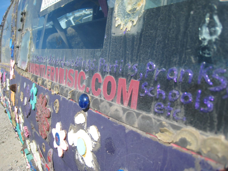Illustration for article titled Groovalicious Purple Princess Of Peace Art Car Falls On Hard Times, Faces Crusher